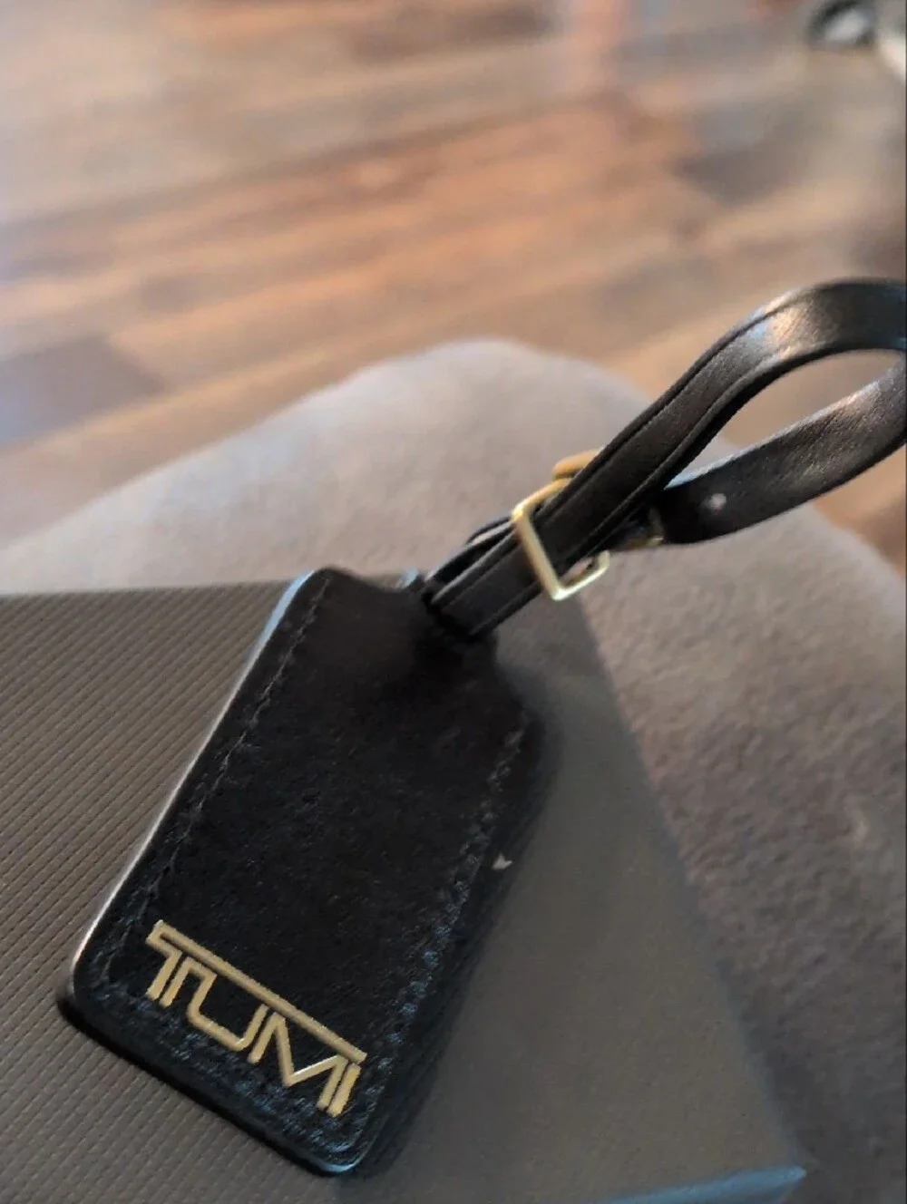 Tumi Black Leather Tag with Gold TUMI Logo